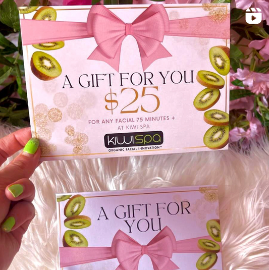 A festive display of Kiwi Spa gift cards, perfect for holiday gifting and pampering.